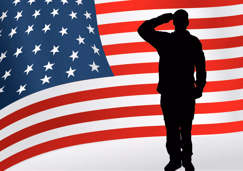 Man saluting silhouetted against an American flag